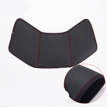 Armrest box kick pad